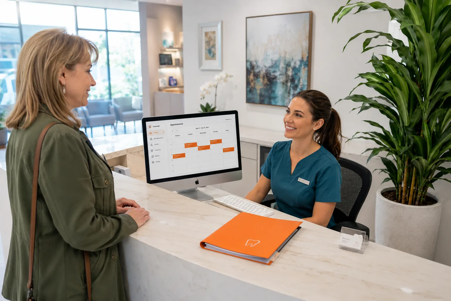 Dental practice management web portal dashboard showing patient appointments and billing on laptop